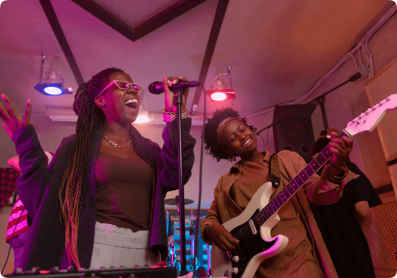 Musicians performing in a colorful venue